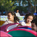 Happy Young Kids at Amusement Park