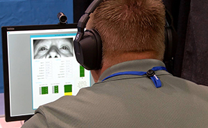 Lt. Mike Petersen of the Cache County Sheriff’s Office demos the EyeDetect lie detection technology at the conference.