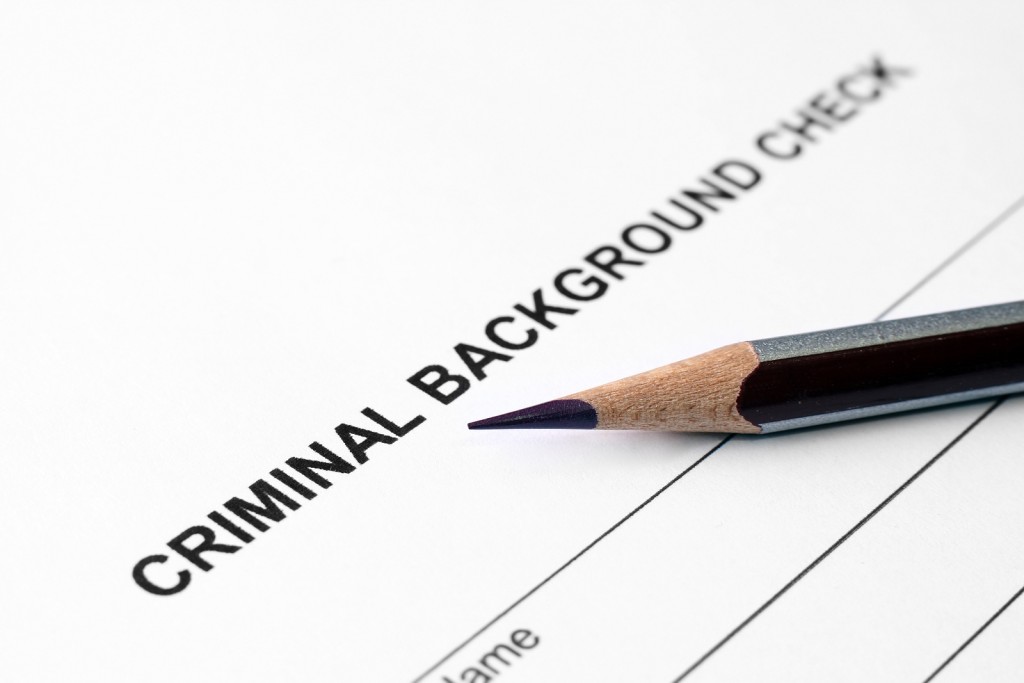 Can background checks accurately determine a job applicant's work eligibility?