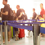 passengers check-in line at the airport